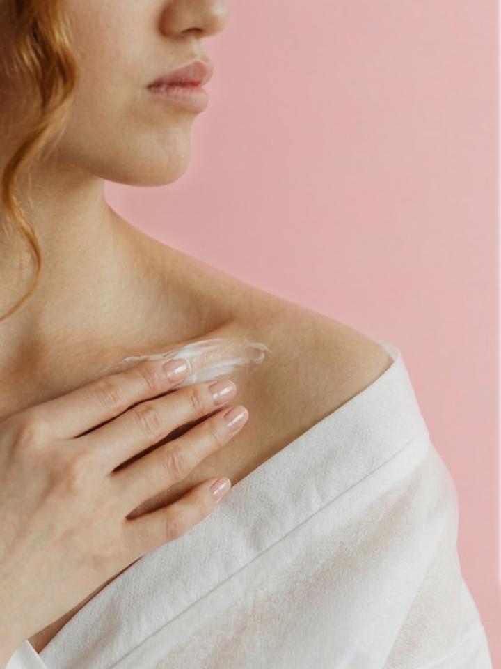 Applying cosmetic cream — skincare in use